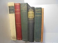 Front spines of six cloth hardcovers