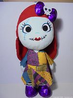 Full view of 30-inch Sally plush doll front