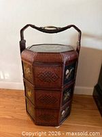 Full view of octagonal three-tier wicker wedding basket showing side panels and handle