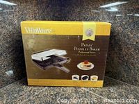 Front of boxed VillaWare Prima Pizzelle Baker