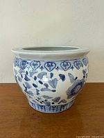 front view of blue and white ceramic planter pot