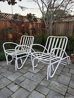 Both Brown Jordan chairs front angled view