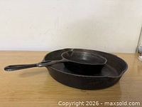Two skillets nested showing relative sizes