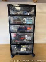 Front view of Iris five-drawer rolling chest with visible contents