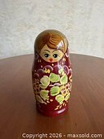 Front view of largest doll