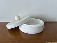 box with lid slightly open showing interior