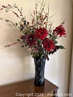 Full view of vase with floral arrangement