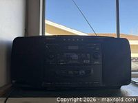 Front view of Sharp boombox showing speakers and control panel