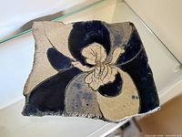 Top view showing floral design and irregular edges