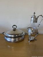 Decanter and chafing dish side by side