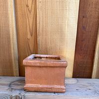 Front angle showing entire square planter