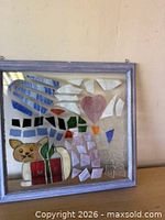 Full view of framed stained glass mosaic showing cat and heart motifs