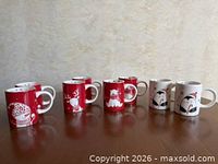 All eight mugs displayed on tabletop