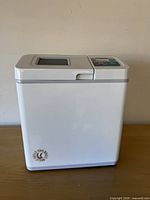 Front view of Zojirushi bread maker closed