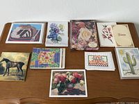 Top view of nine assorted card sets on table