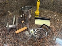 Group image showing all six vintage kitchen tools