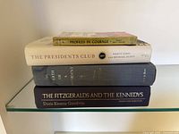 Stack of four presidential history books