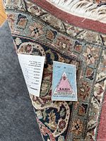 Back of rug showing Kaleen label and handknotted construction