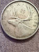 Obverse showing caribou and date 1959