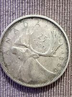 Reverse showing caribou and date 1960