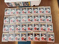 Grid view of roughly thirty Wayne Gretzky #520 Topps cards