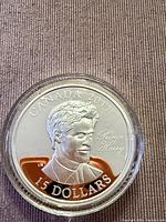 Obverse view of 2011 Canada $15 Prince Harry silver proof coin in capsule
