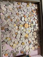 Tray view showing bulk of assorted coins