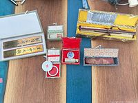 All boxed Chinese calligraphy and seal items displayed