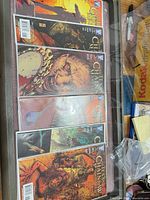 All six comics laid out showing covers
