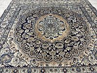 Full view of Naein square rug showing entire design and borders