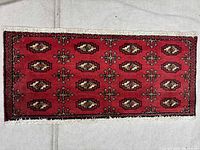 Full view of Torkaman wool rug showing design and fringe