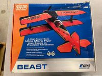 Box showing E-flite UMX Beast branding