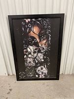 Full view of framed artwork
