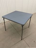 Table standing, legs extended