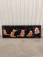 Front view of framed print featuring orange tabby kittens and bubbles on black background