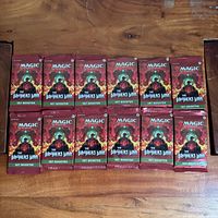 All 12 sealed booster packs laid out face up