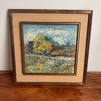 Full view of framed oil landscape painting