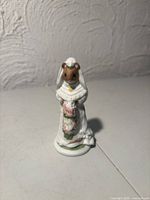 Front view of Celestine mouse bride figurine showing gown, bouquet and veil