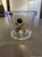 Front view of glass ice bucket showing bowling motif decal