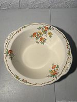 Top view of bowl showing floral pattern, rim and interior