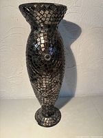 Full view front of tall mosaic glass vase