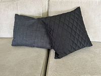 Front view of both pillows on sofa