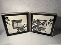 Both framed wall art pieces side by side