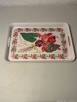 Top view showing full floral design, border, handles