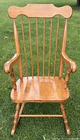 Front view of spindle-back Windsor rocking chair