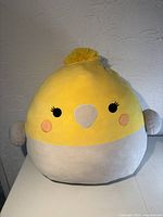 Front view of Squishmallows Charlize Cockatiel plush showing full body details.