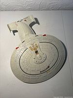 Top view of entire saucer section and partial neck showing overall condition and missing components