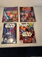Front covers of all four publications laid out