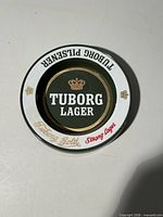 Top view displaying Tuborg Lager logo and rim text