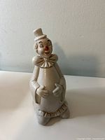 Front view of porcelain clown bell